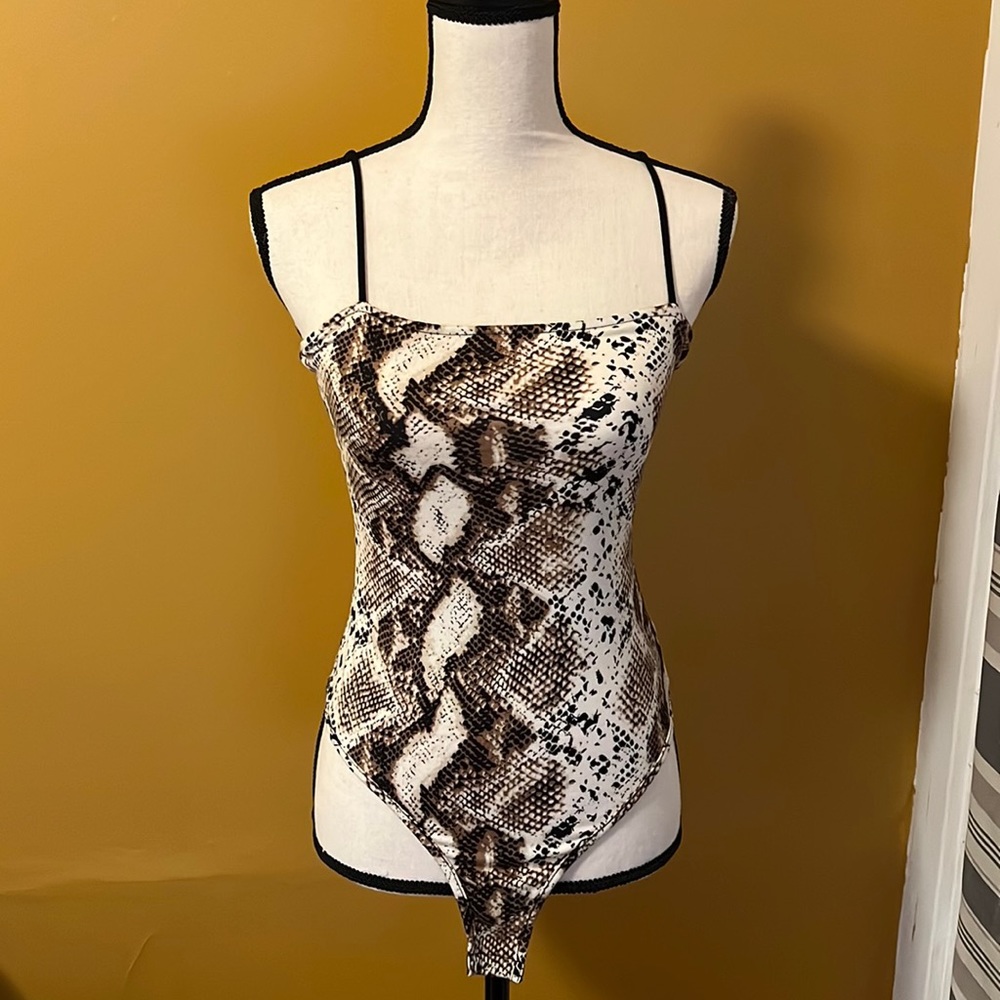 Forever 21 snake print body suit.
